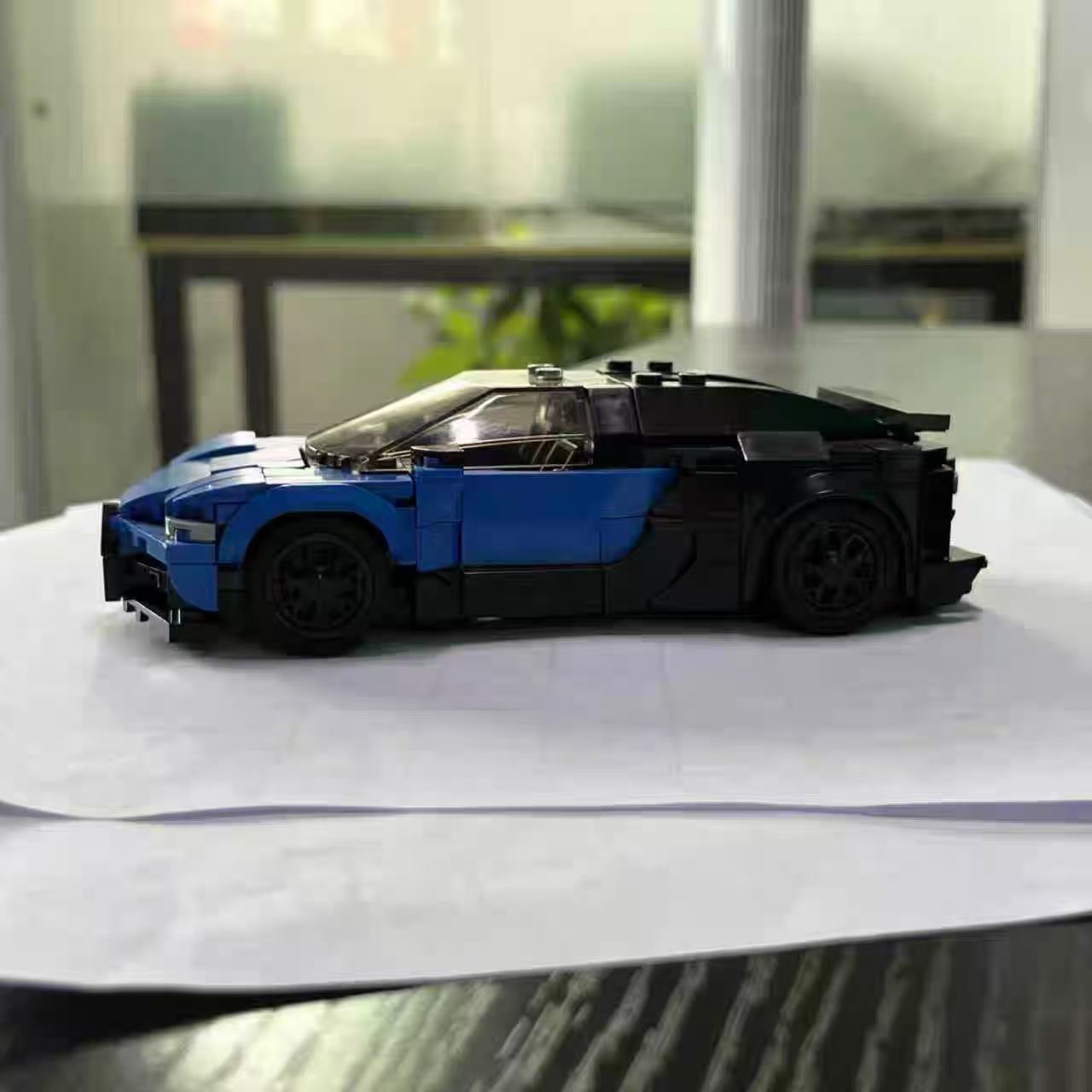 Blue black brick car side profile